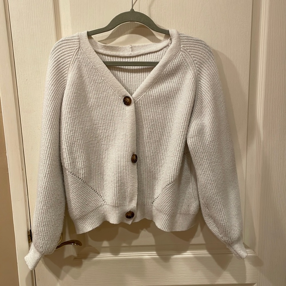 White knit button up sweater